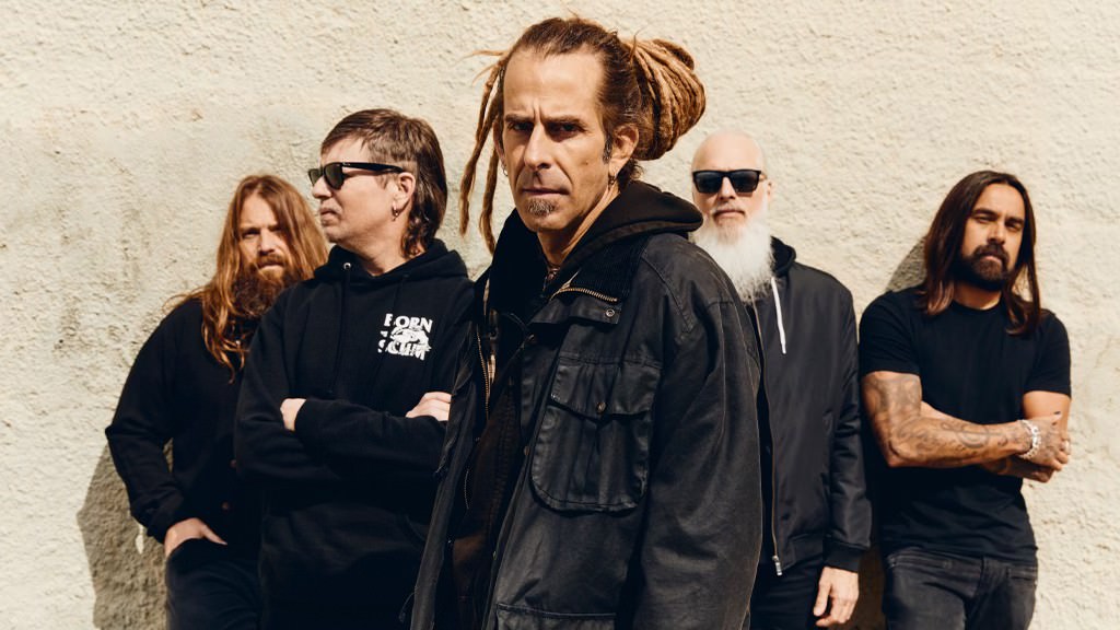 Lamb of God projecting an unfiltered, intense aura reminiscent of heavy metal's defiant roots.